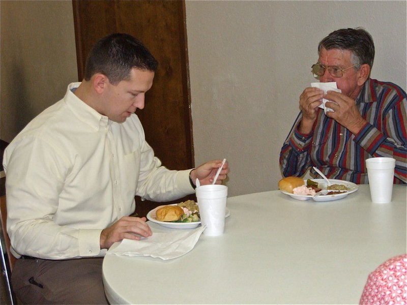 Image: Reaching out one bite at a time — Pastor Todd Gray enjoys a turkey and dressing meal along side Central Baptist Church members and visitors from around the community during the Wednesday luncheon hosted by the CBC on the first Wednesday of each month.