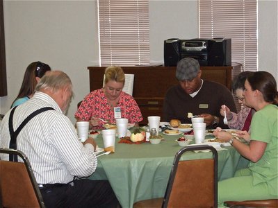 Image: Catching up — The meal, which is offered on the first Wednesday of every month, provided an opportunity for everyone to catch up on local news and greet friends.