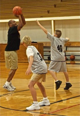 Image: Money! — You can not give Coach Mayberry that much room! Coach accepted the 7th grade challenge and sank the 3-pointer.