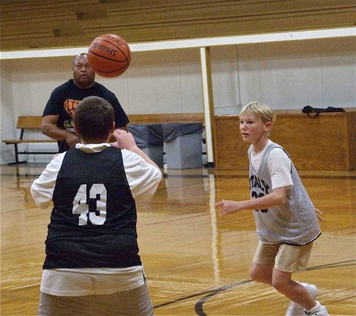 Image: You take it! No, you! — Coach Mayberry passes to James Prader(43) who passes back to Coach who passes back to Prader…poor Cody.