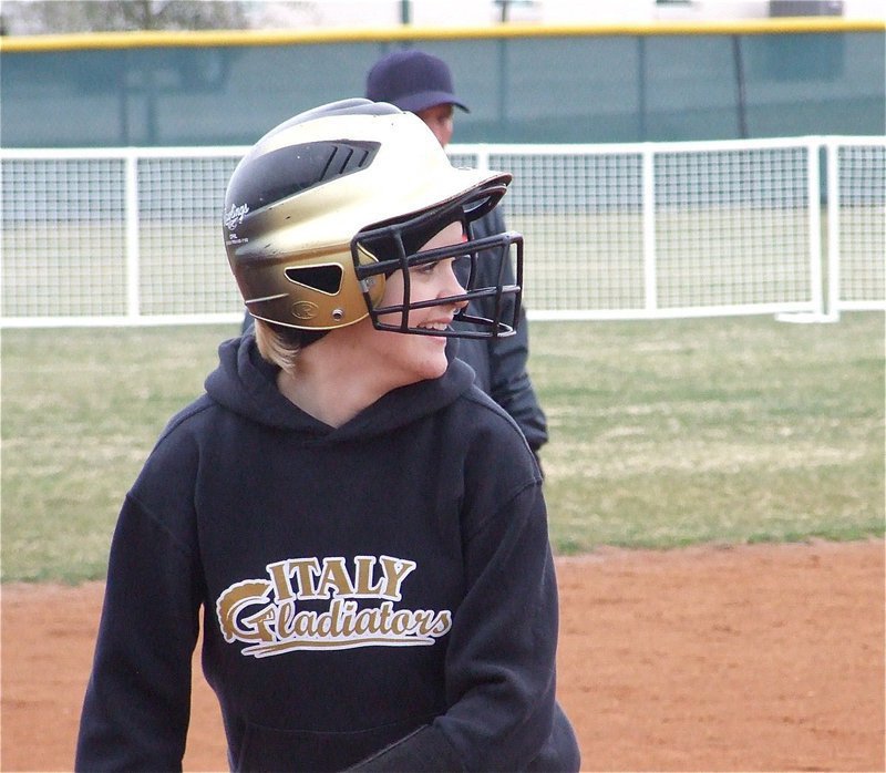 Image: Happy to get a hit — Courtney Westbrook is all smiles at 3rd base against Blooming Grove.