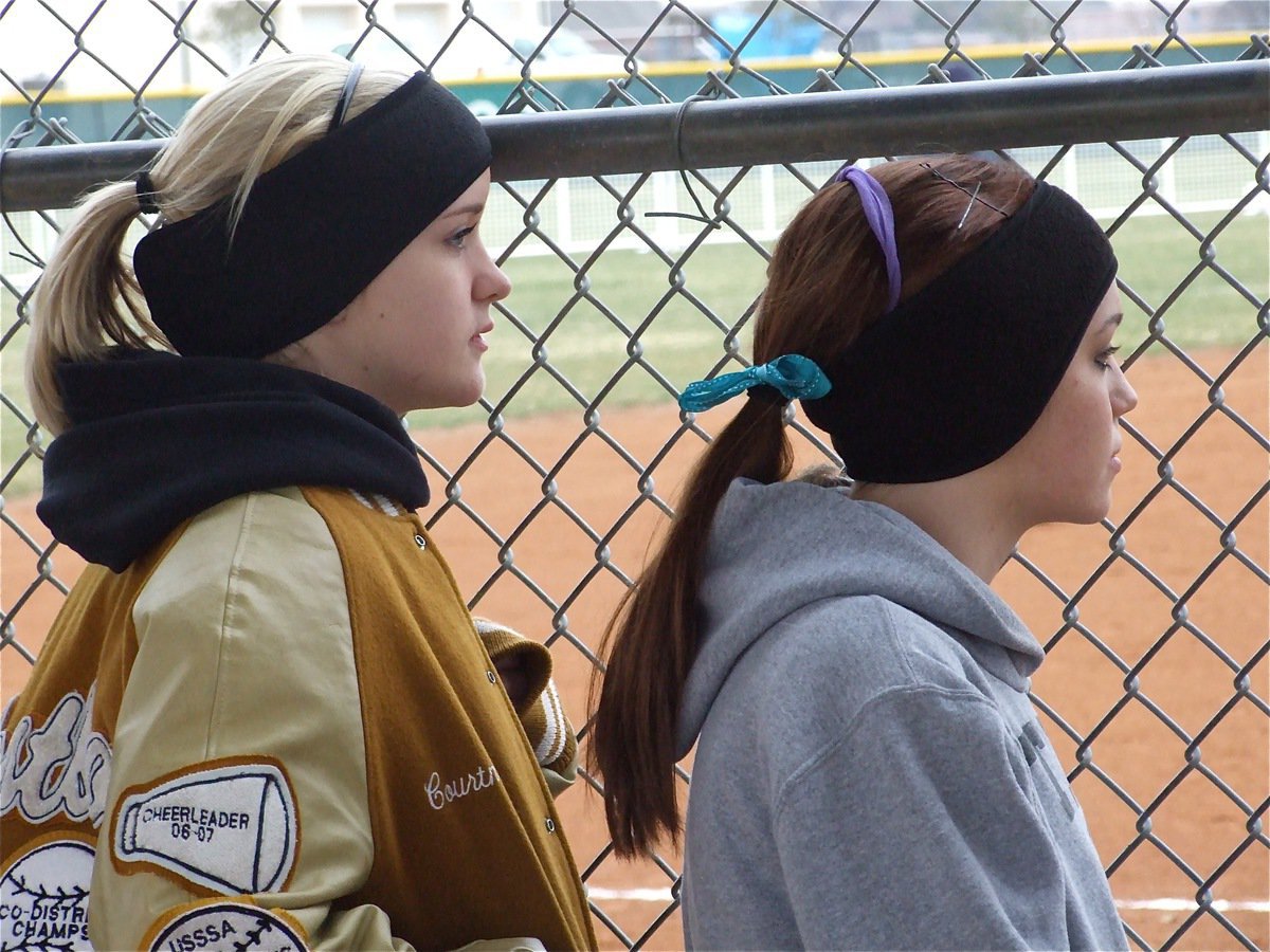 Image: Still relaxing — Courtney and Drew take advantage of a break during the game against Blooming Grove.