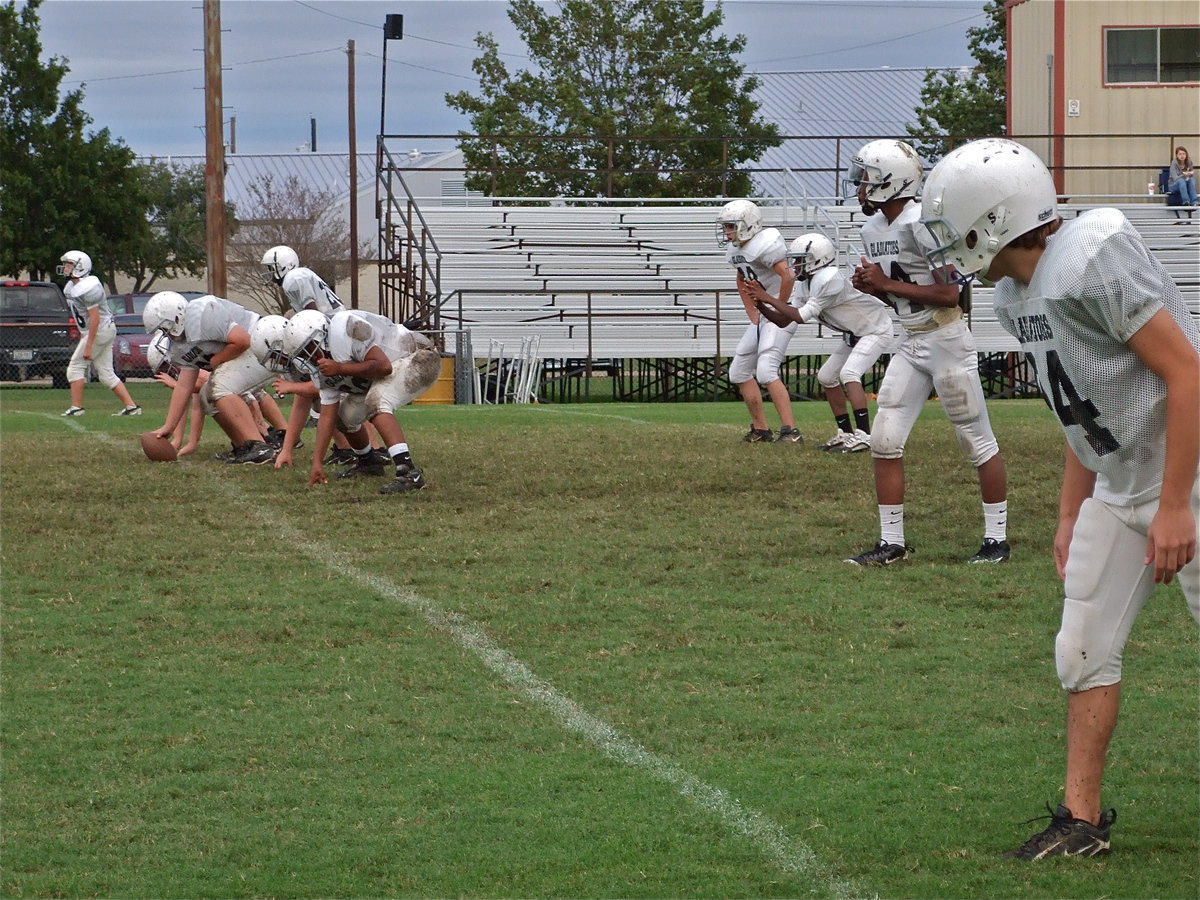 Image: Run this play — Italy’s offense takes practice snaps befor the game.