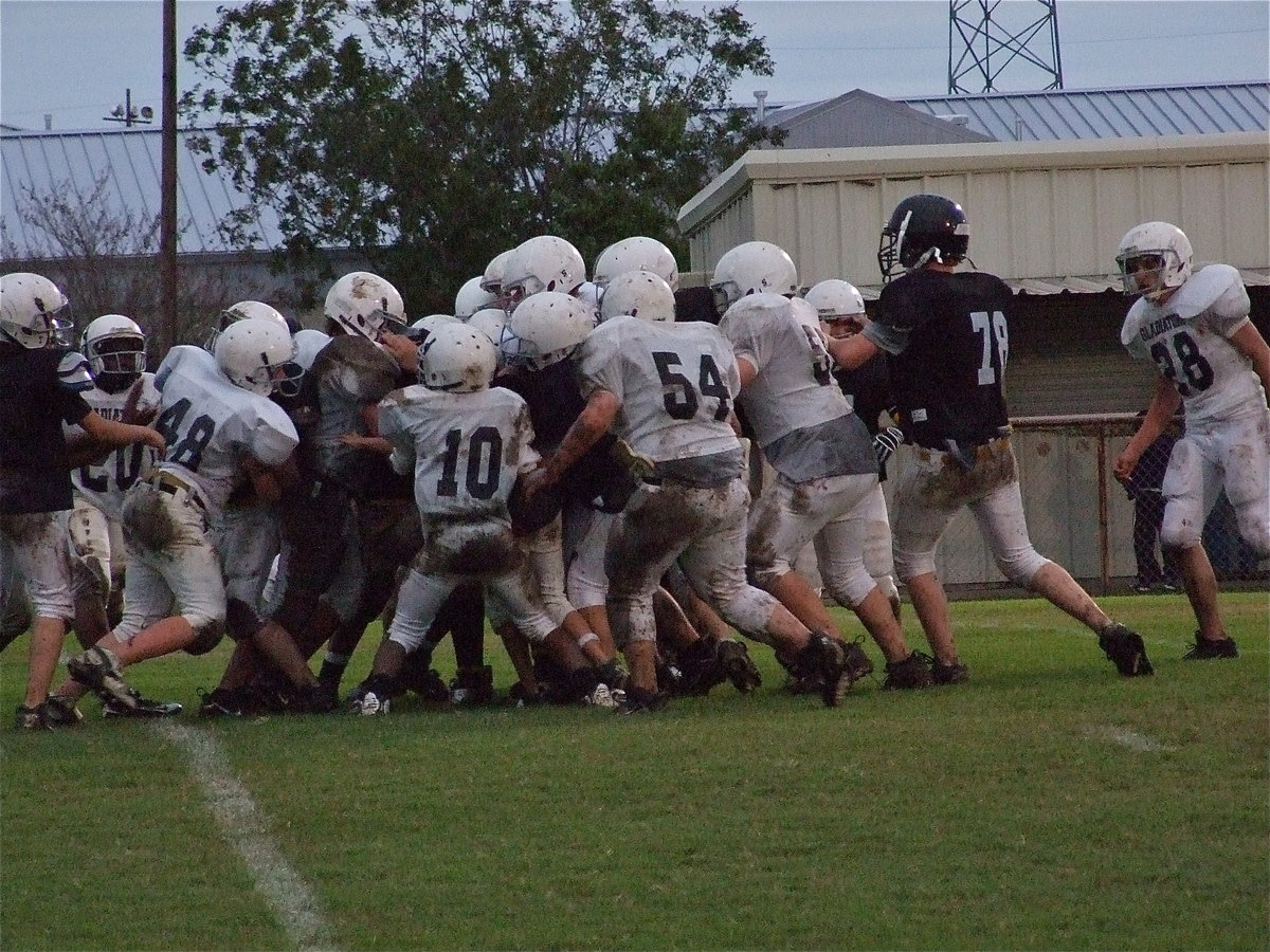 Image: Dawson is denied — Italy tries to keep the Bulldogs out of the endzone.