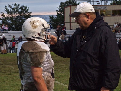 Image: Do your job! — Coach Robert Sollers tries to point linebacker Zain Byers in the right direction.