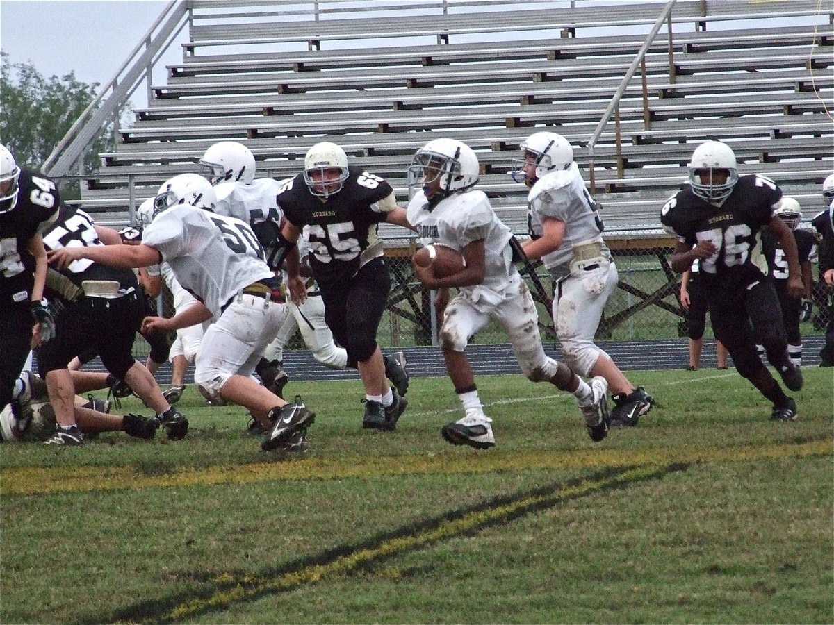 Image: Eric jabs at the Jags — Eric Carson keeps the ball in his left hand while leading Italy the right way.