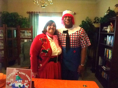 Image: Carolyn Powell &amp; Chris Baker — Carolyn Powell (Activities Director) and Chris Baker (Marketing Director) are dressed up and ready for the fun to begin.