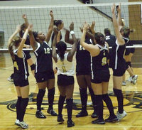 Image: Add a point — The Lady Gladiators played against the Lady Bulldogs from Palmer Tuesday night in a pre-season game.