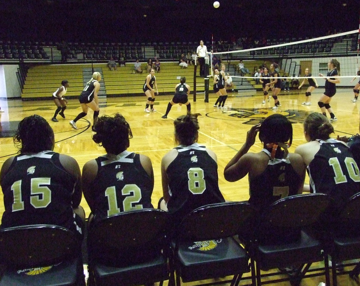 Image: Lady Gladiators — The Lady Gladiators wait their turn on the floor.