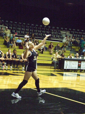 Image: Megan serves — Sophomore, Megan Richards, serves to the Lady Bulldogs.