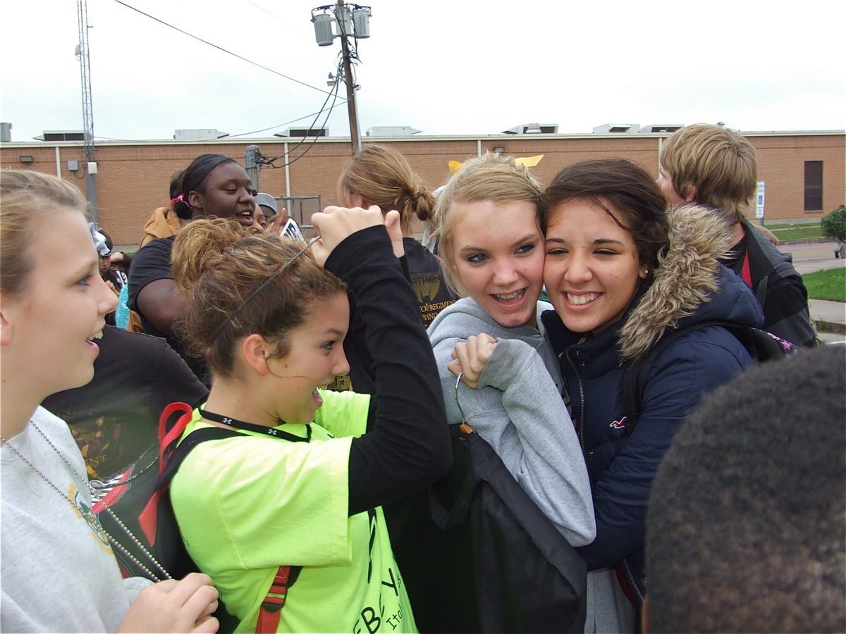 Image: Hugs and smiles — Everyone was excited for the band.