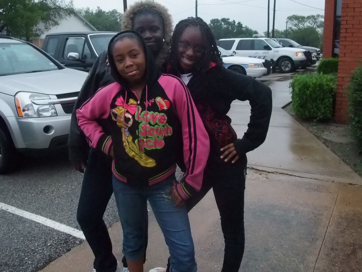 Image: Attitude! — Leandrea Holbert, Quianterea Wahington and Ja’Lisha Holbert full of attitude waiting to have a good time.