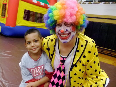 Image: Who’s This Clown? — Sally the clown loves the kids.