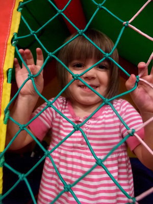 Image: Let Me Out! — Morgan Chambers having fun in the bounce house.