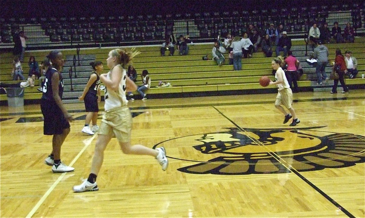 Image: Here we go Italy! — Madison Washington(32) and Tara Wallis(2) advance the ball past midcourt.