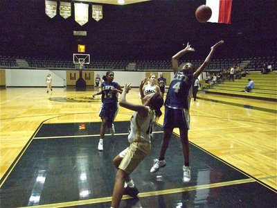 Image: Ryisha tries to rebound — Ryisha Copeland and her 8th grade girls lost 12-11 as the Dallas Life Lady Lions scored the go ahead points with 0:15 left in game.