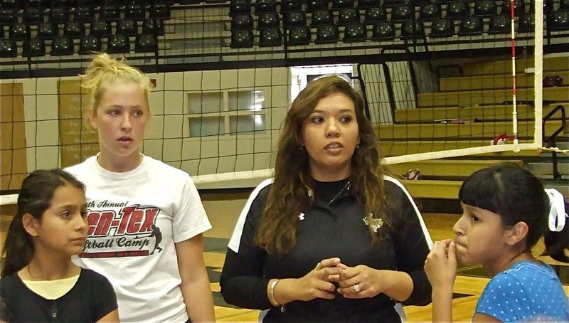 Image: Tina talks — Coach Tina Richards talks to the teams after the practice. And when Coach Tina Talks…players listen.