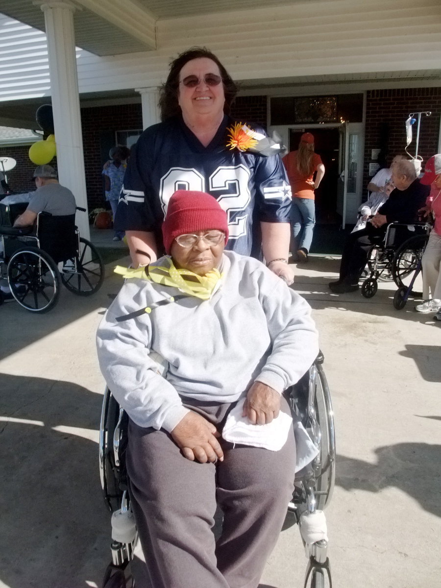 Image: Let’s Eat — Carolyn Powell and resident getting ready for fun.