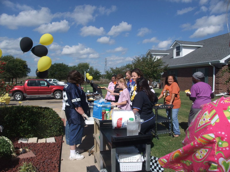 Image: Lined Up For Barbeque — Everyone was ready to eat.