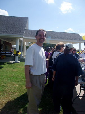 Image: Dr. John — Dr John said, “My staff  and I were invited to celebrate with the residents today and join in the tail gating party and barbeque. We are here to honor the residents.”