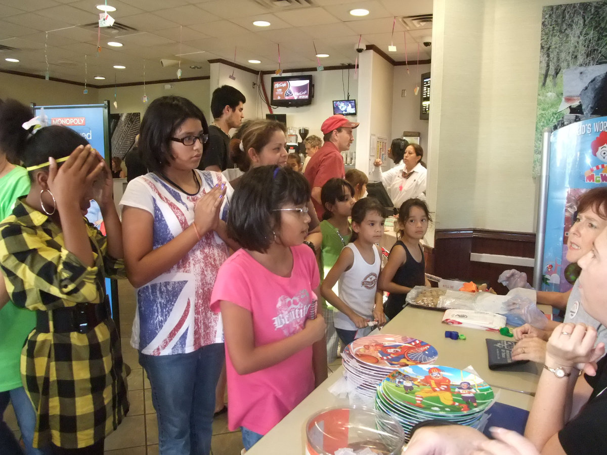 Image: What Are You Selling? — Students are lined up to buy.