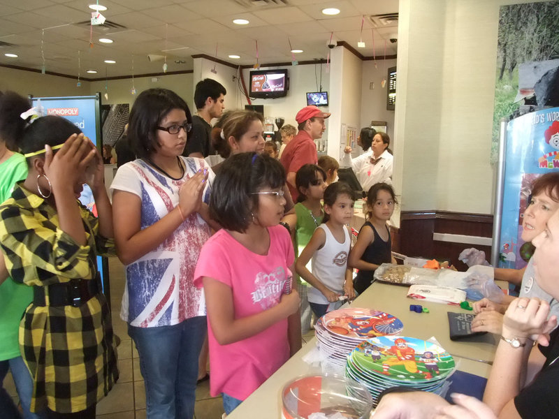 Image: What Are You Selling? — Students are lined up to buy.