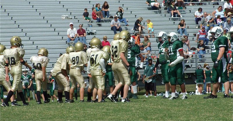 Image: Get set — Quarterback Ryan Connor sets his A-Team offense.