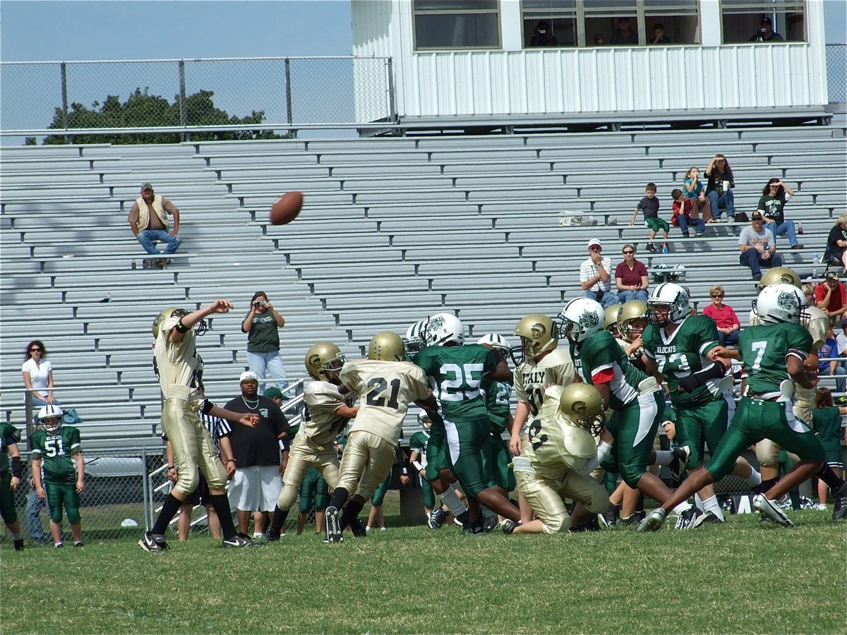 Image: Connor goes deep — The A-Team offensive line buys time for Connor as he heaves a deep pass.