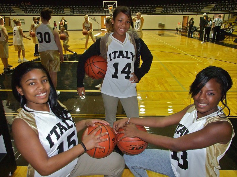 Image: Italy’s Junior High girls are “pretty” good at basketball…and posing — 8th graders Ashley Harper(15), Ryisha Copeland(14) and Kendra Copeland(13) got this picture posing thing down. And they are pretty good at basketball as well. The 7th grade girls destroyed Irving North Hills 31-5 while the 8th grade girls proved they are the Queens of the North Hills with a 21-15 win over Irving.