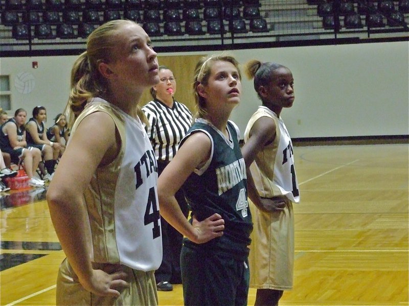 Image: Look at that… — Jaclynn Lewis(41), Kortnei Johnson(12) and a, just as curious, North Hills player, watch the fate of the INH free throw attempt.