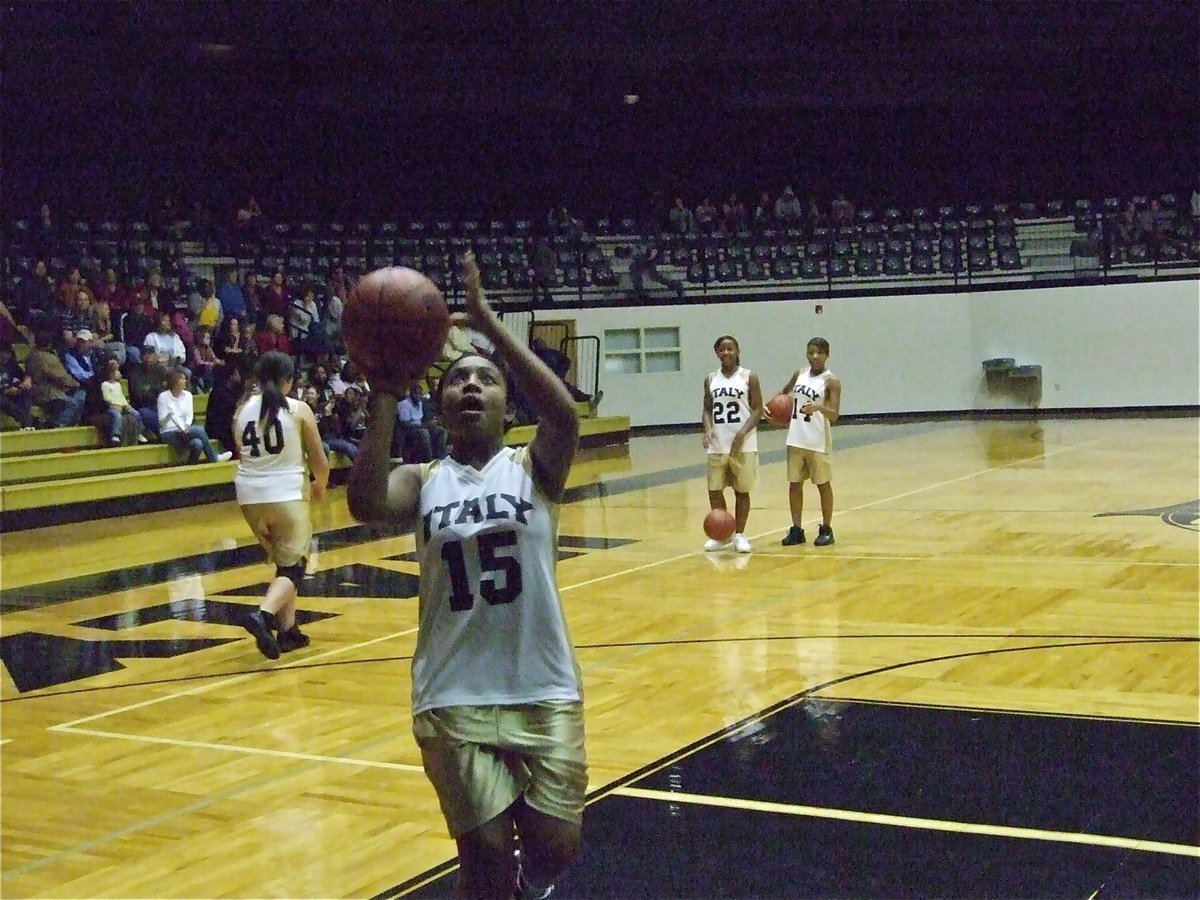 Image: Here we go, Italy! — 8th grader Ashley Harper gets warmed up before the game against North Richland Hills.