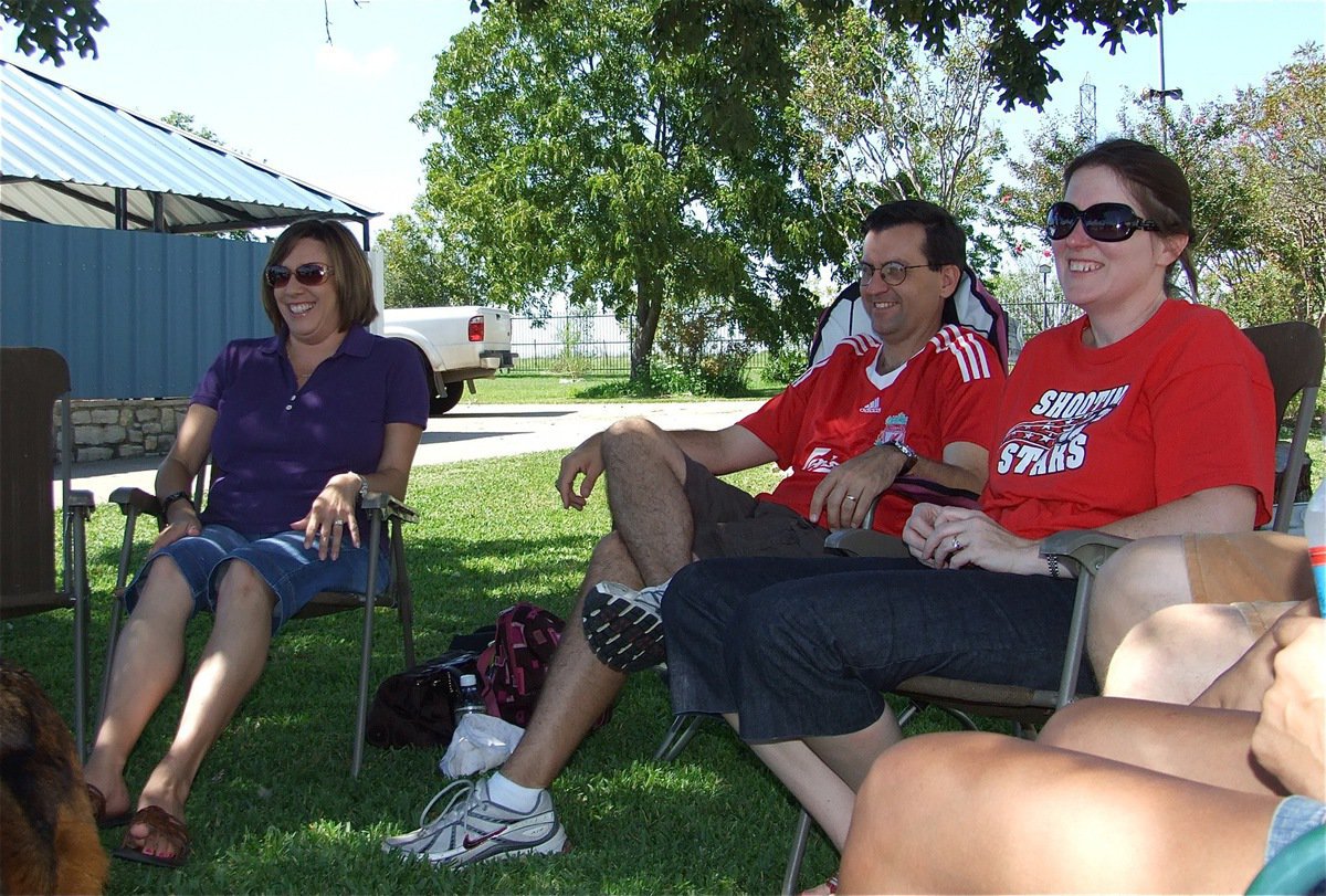 Image: Kay, David and Sandy — The 1989 graduates and their families enjoyed fun in the sun on Saturday at the former childhood home of Sandy Brown-Marek.