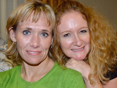 Image: Social Butterflies — Crystal Norcross-Reeves and Amy White Morton socialize during the reunion dinner.