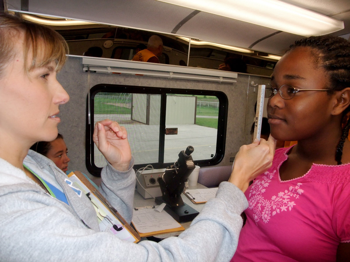 Image: Kierra Wilson and Dr. Haas — Kierra said, “I am getting my eyes checked and I hope I get to get a new pair of glasses.” Kierra is in the seventh grade.