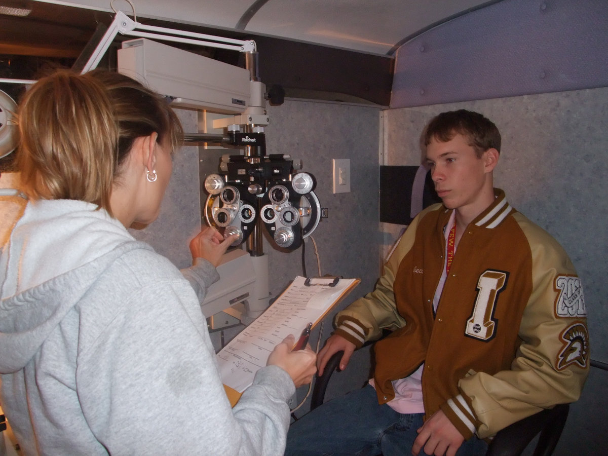 Image: Dr. Haas &amp; William Macomb — “I am getting my eyes checked. I am really happy about it because I am blind as a bat,” explained William.