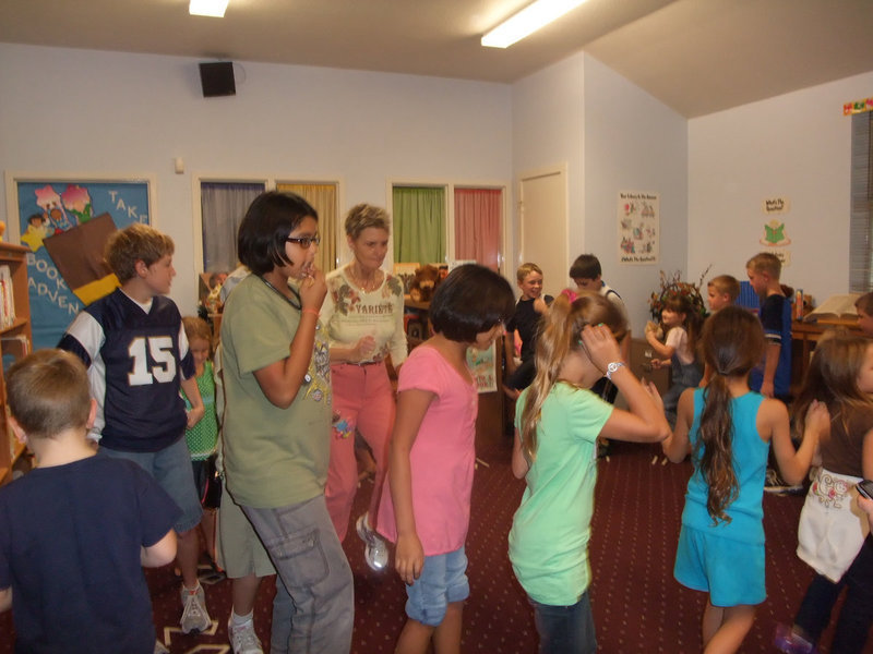 Image: Book Walk — These children were trying to win a free book in the “Book Walk” game.