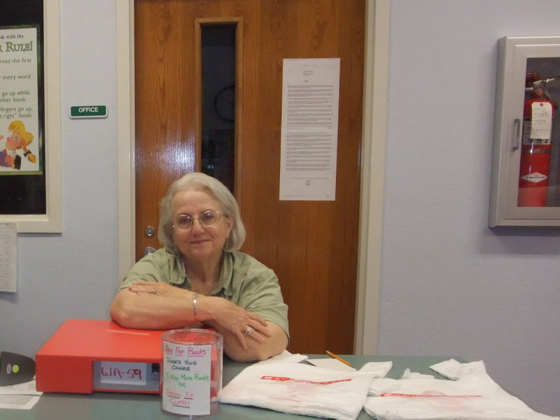 Image: Ann Byers — Ann Byers was helping with the book fair and said, “Look how happy the kids are. They just love this. Parents can come and buy books for thier children but they can also buy books that are donated to the classroom. So each classroom gets to build up their own little library.”