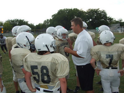 Image: Coach Coker talks — Coach Matt Coker talks with the 7th Grade team during a timeout.
