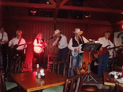 Image: Final Showdown — Final Showdown was the featured band for Miss Millie’s grand opening.