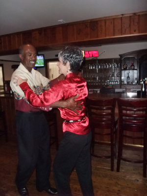 Image: Light on Their Feet — Robert Wilson and Peaches Frisch were having fun dancing to the music.
