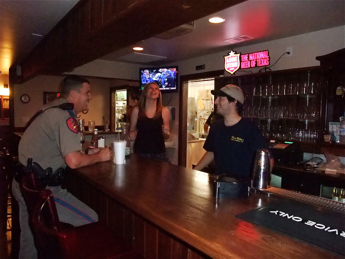 Image: Everyone’s Having Fun — This officer was having fun and ready to eat.