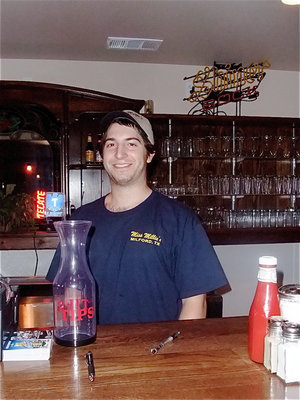 Image: Joey Kennerd — Joey Kennerd (owner Joe Kennerd’s son) said, “I think the grand opening is going great. We have a lot of people here. We are really excited to be in Miford to open the restaurant for all the people in the area.”
