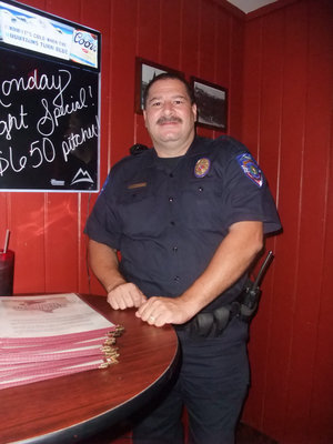 Image: Chief Phoenix — Police Chief Phoenix (Milford Police Department) was security for the grand opening. “I have eaten here several times, I love the food and the music. I think it will be good for the community.”
