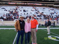 Image: David, Frances &amp; Daniel — Daniel Seay gets a photo taken with his parents, Frances &amp; David Seay of Italy, after the Aledo Bearcats won the title.