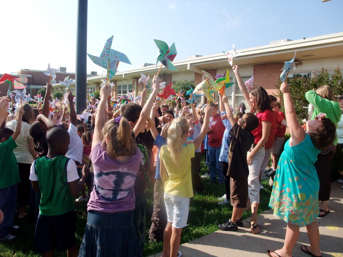 Image: Everyone Look Up — Carolyn Maevers told the students to look up at the flag.