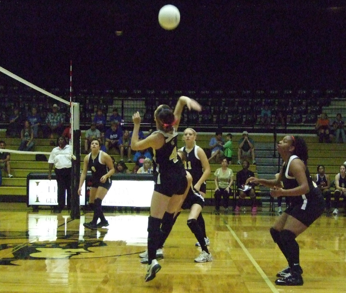 Image: Drew gets it over — Senior Drew Windham hammers the ball over the net.  The Lady Gladiators hosted the Lady Bears from Frost on Saturday morning.