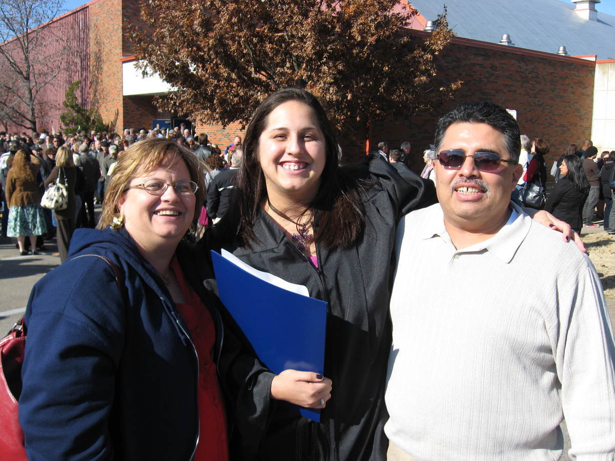 Image: Proud parents — Amanda poses with mom and dad, Kim and Jessie Zambrano