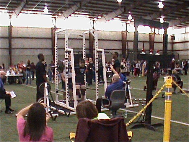 Image: Preparing to Squat — Kaytlyn Bales gets set to execute a qualifying squat of 250 pounds.