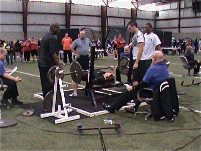 Image: Hey, Bales! — Kaytlyn’s father and powerlifing coach, Italy High School’s athletic director Craig Bales, sends Kaytlyn to the bench.