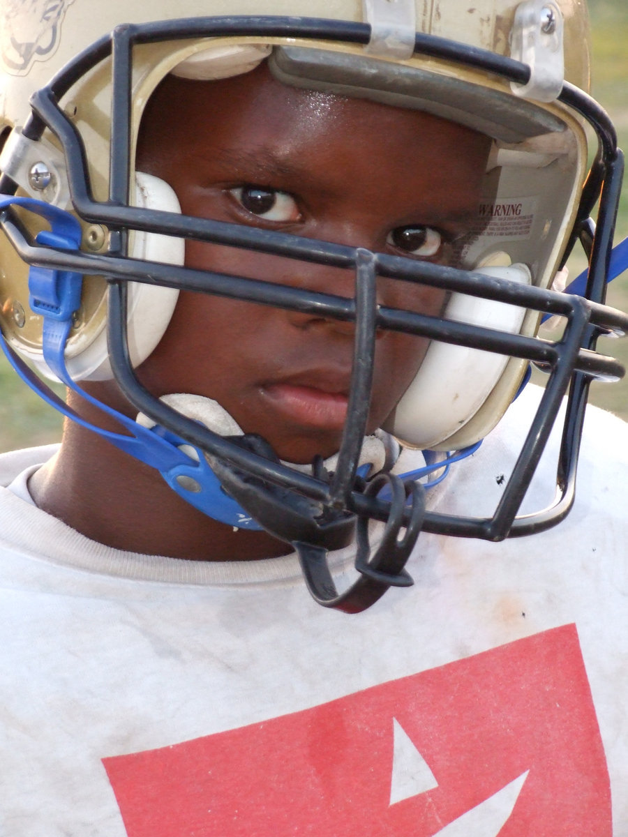 Image: Harris is a hitter — Players apply the skills that they have learned during the Gladiator Football Camp this summer with Italy Football Head Coach Craig Bales and his staff.